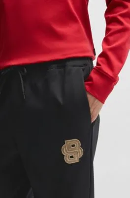 BOSS x Creation of the Gods tracksuit bottoms in cotton